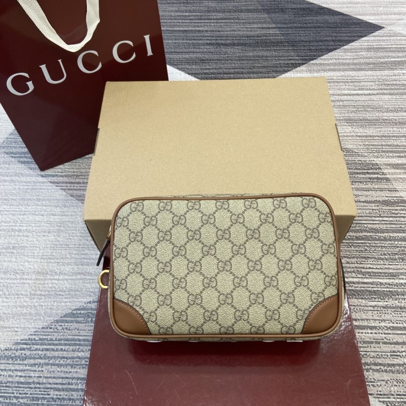 G*u*i clutch bags